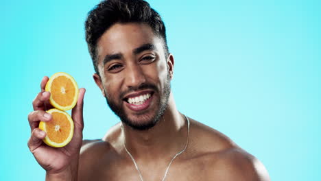 beauty, orange and face of man in studio