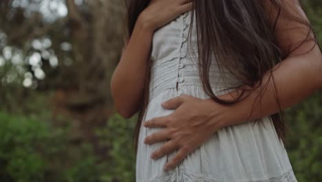 women is doing breathwork in the forrest