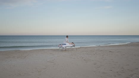 beach massage therapy session