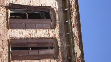 abandoned building with damaged windows