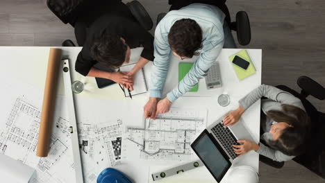 architect plans arial view business meeting showing teamwork