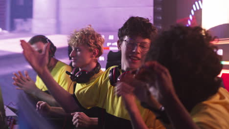 esports team celebrating a victory in online gaming competition