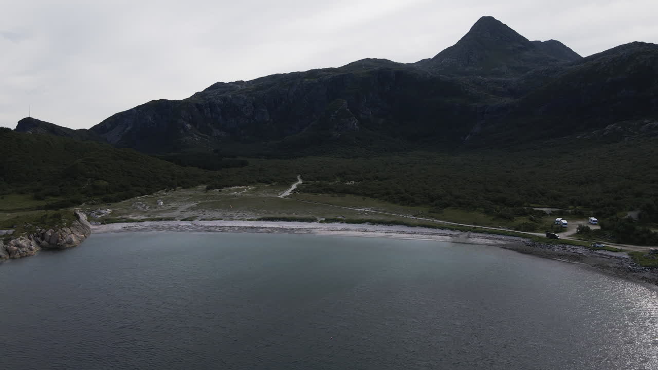 Aerial View Of Breivika Beach In Donna Municipality, Norway - drone pullback
