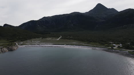 aerial view of breivika beach in donna municipality, norway - drone pullback
