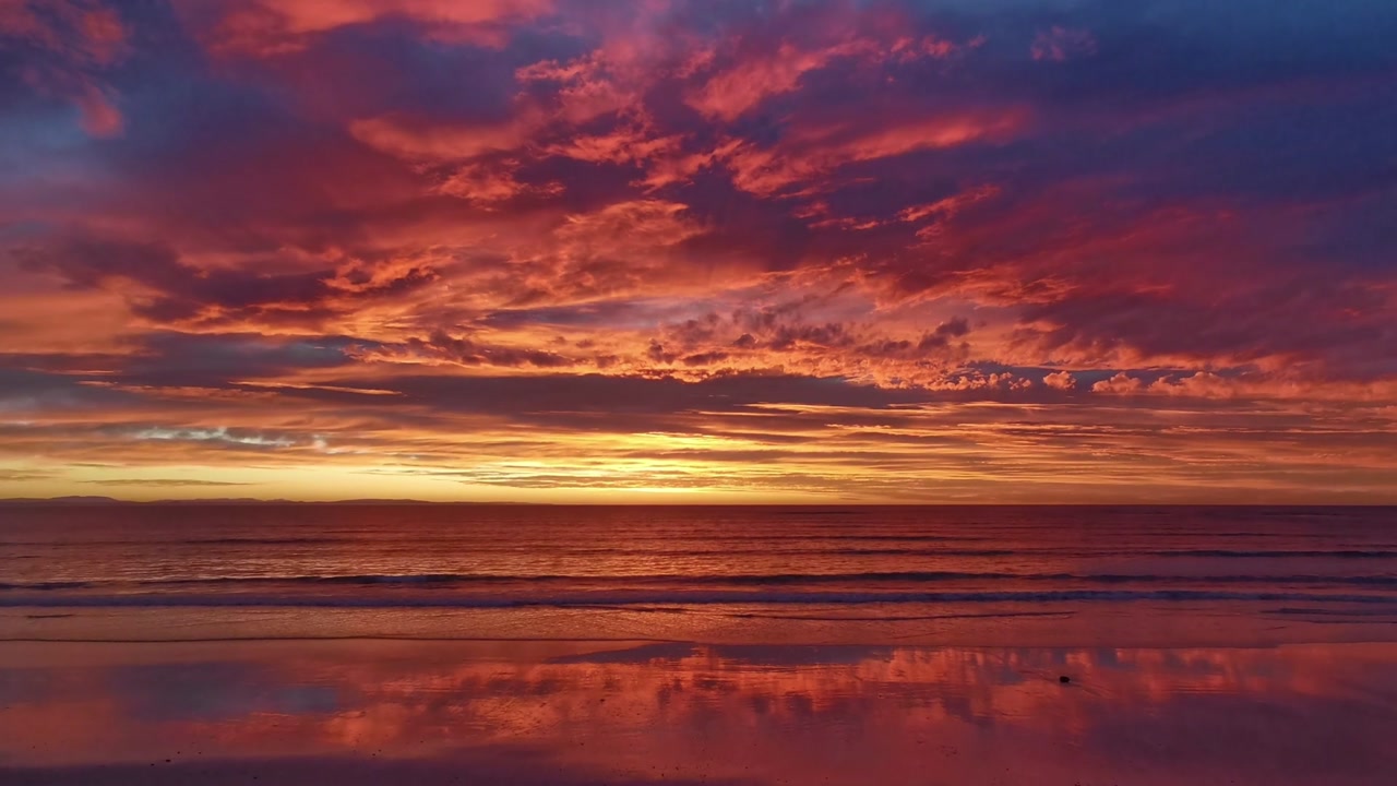A magnificent sunrise over the Indian Ocean in Struisbaai, South Africa.