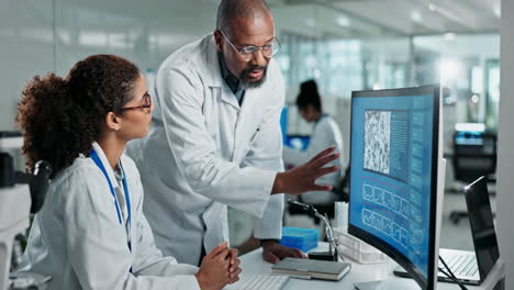 scientists collaborating on research analysis in a lab