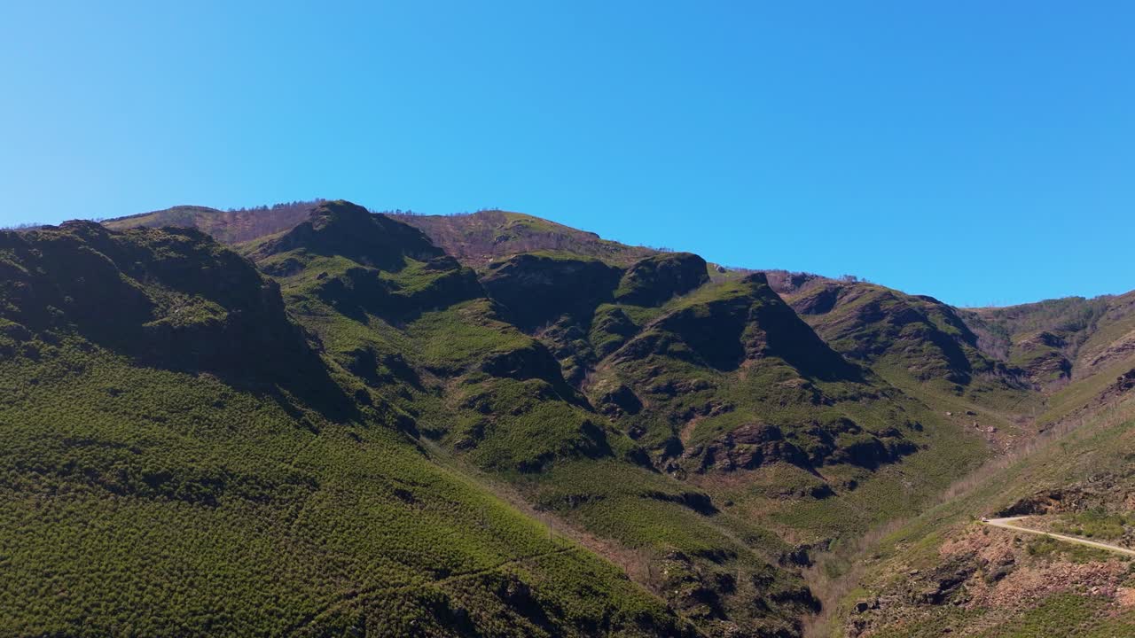 Green Mountains With Remote Road Near The Town Of Casela, Samos, Spain. Aerial Drone Shot