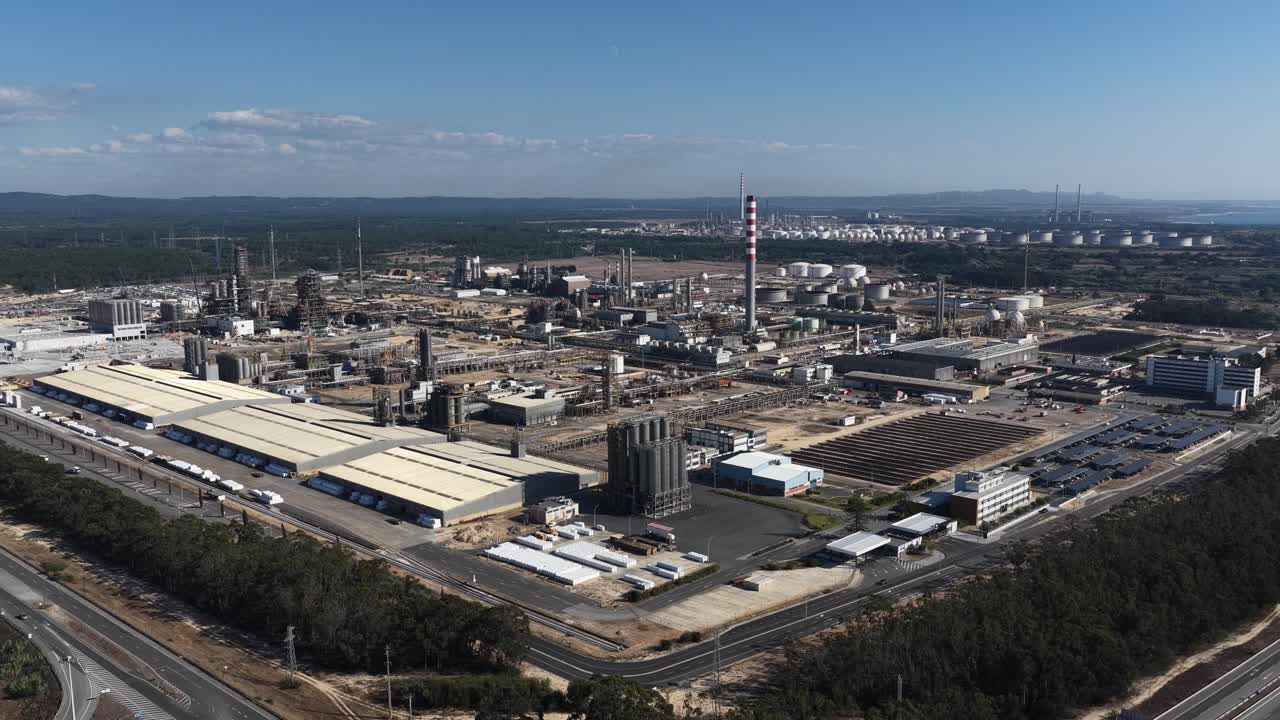 Wide drone shot of big refinery on a sunny day