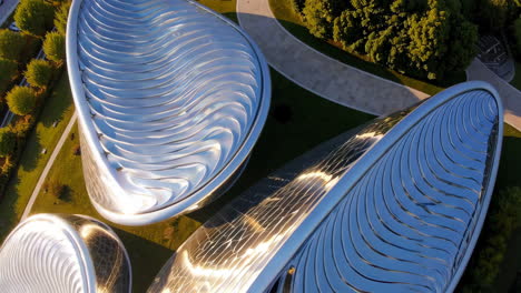 modern architectural complex with unique metallic facade