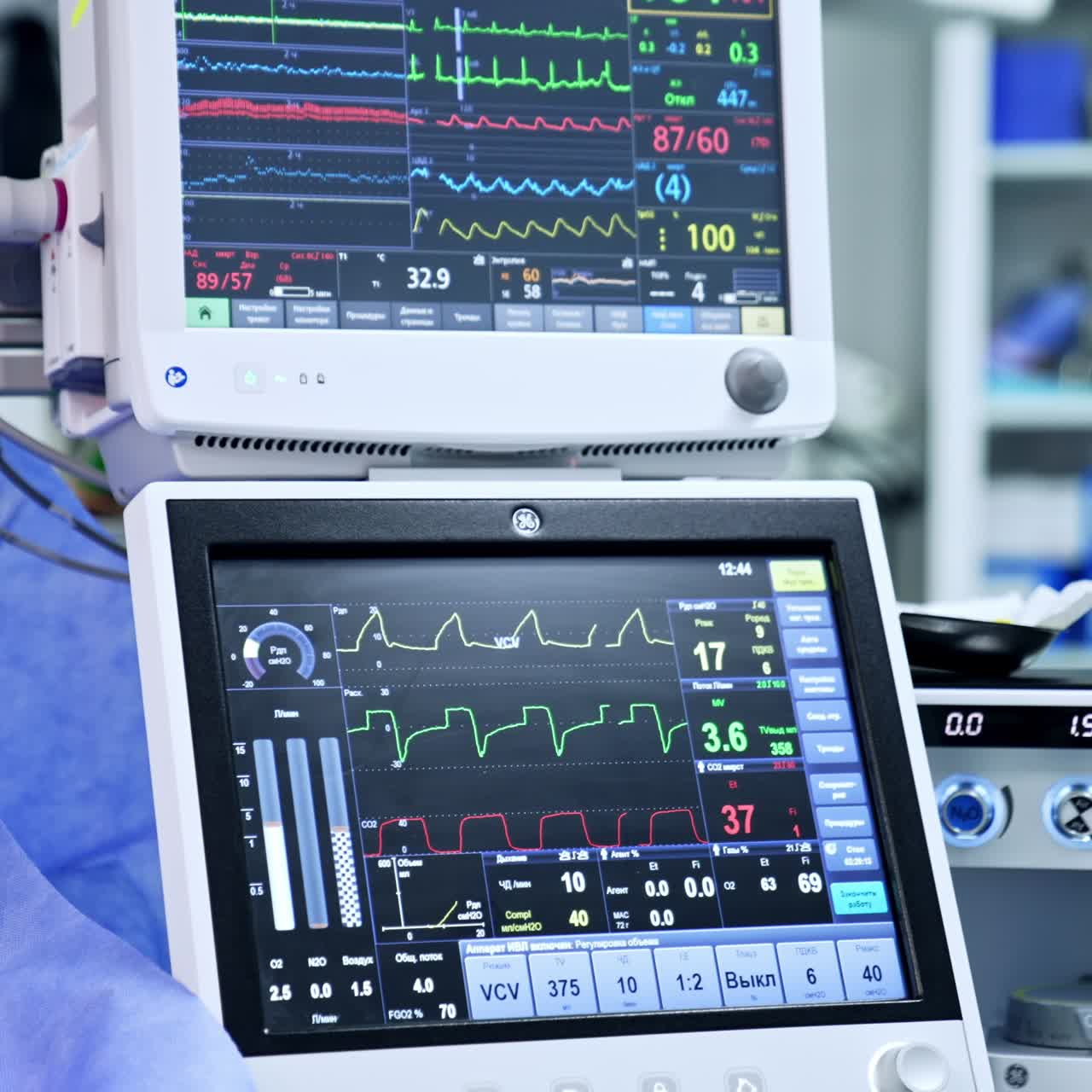Double monitors of the artificial lung ventilator. Life signs of a person under surgery