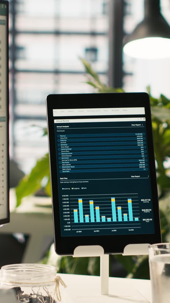 Vertical video Modern workspace with key performance indicators data on display