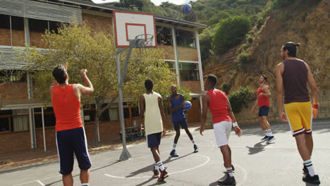 basketball players practicing in basketball court