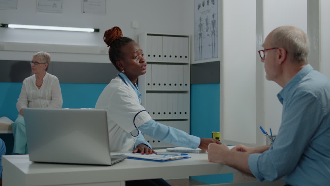 Woman working as medic using stamp on checkup files