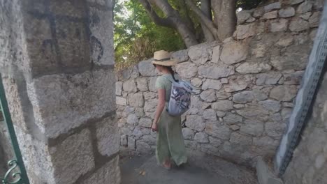 Beautiful-female-model-walking-down-the-long-stairs-of-Dubrovnik