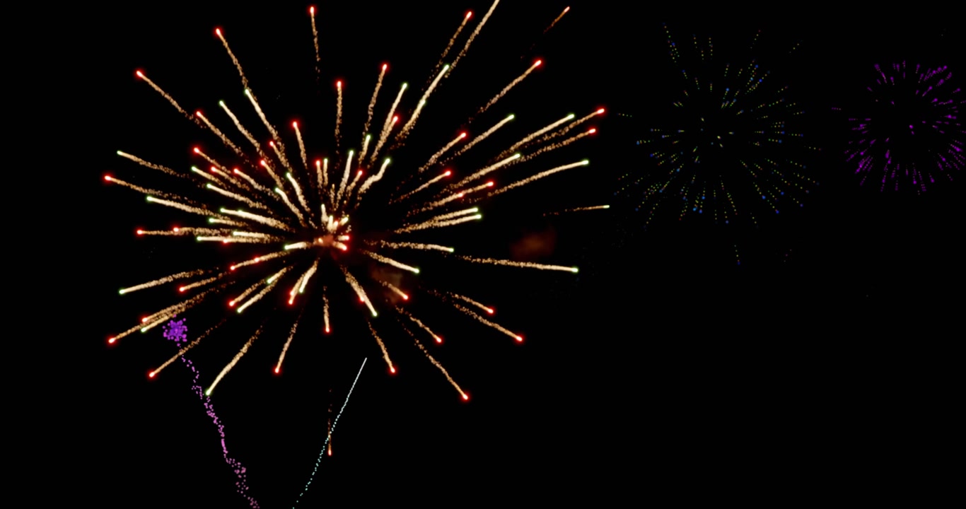 Animation of colourful christmas and new year fireworks exploding in night sky