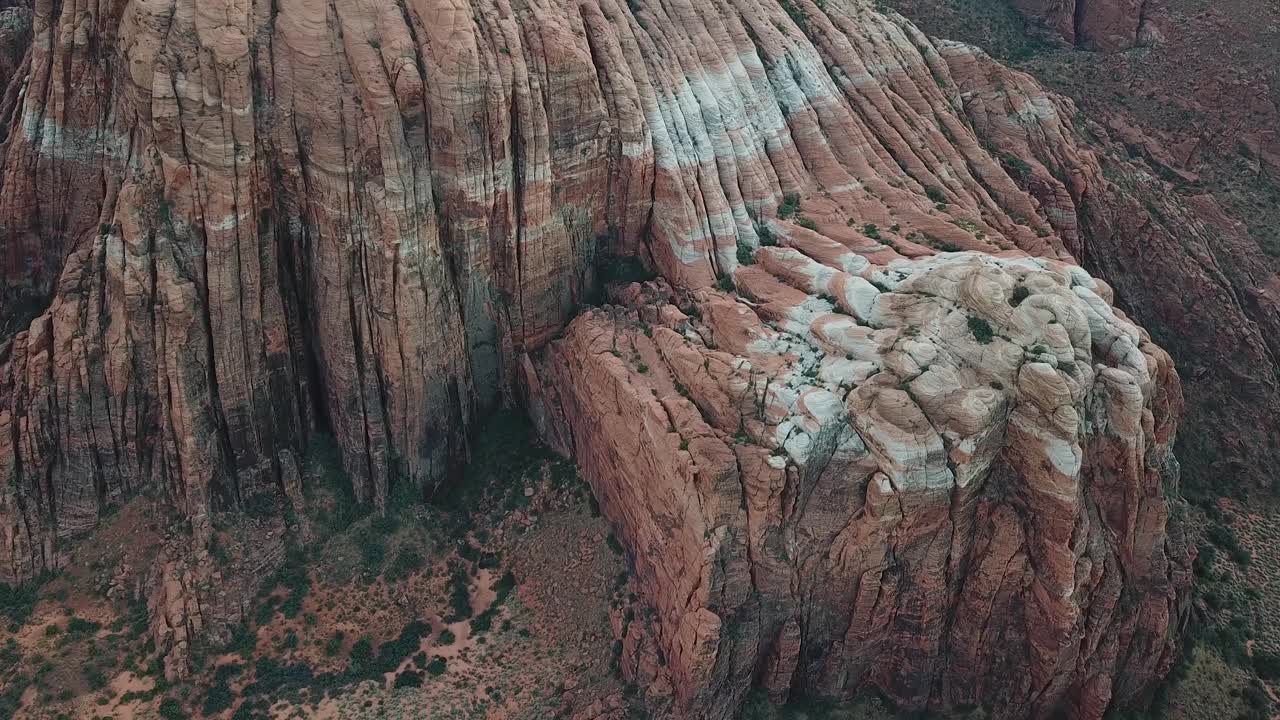 Drone Aerial View of Stange Layered Red Rock Formations in Snow Canyon State Park, Utah USA