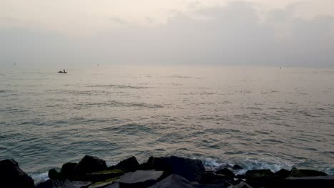 4k-Still-Shot-of-Rock-Beach-captured-in-the-early-morning-during-Sunrise