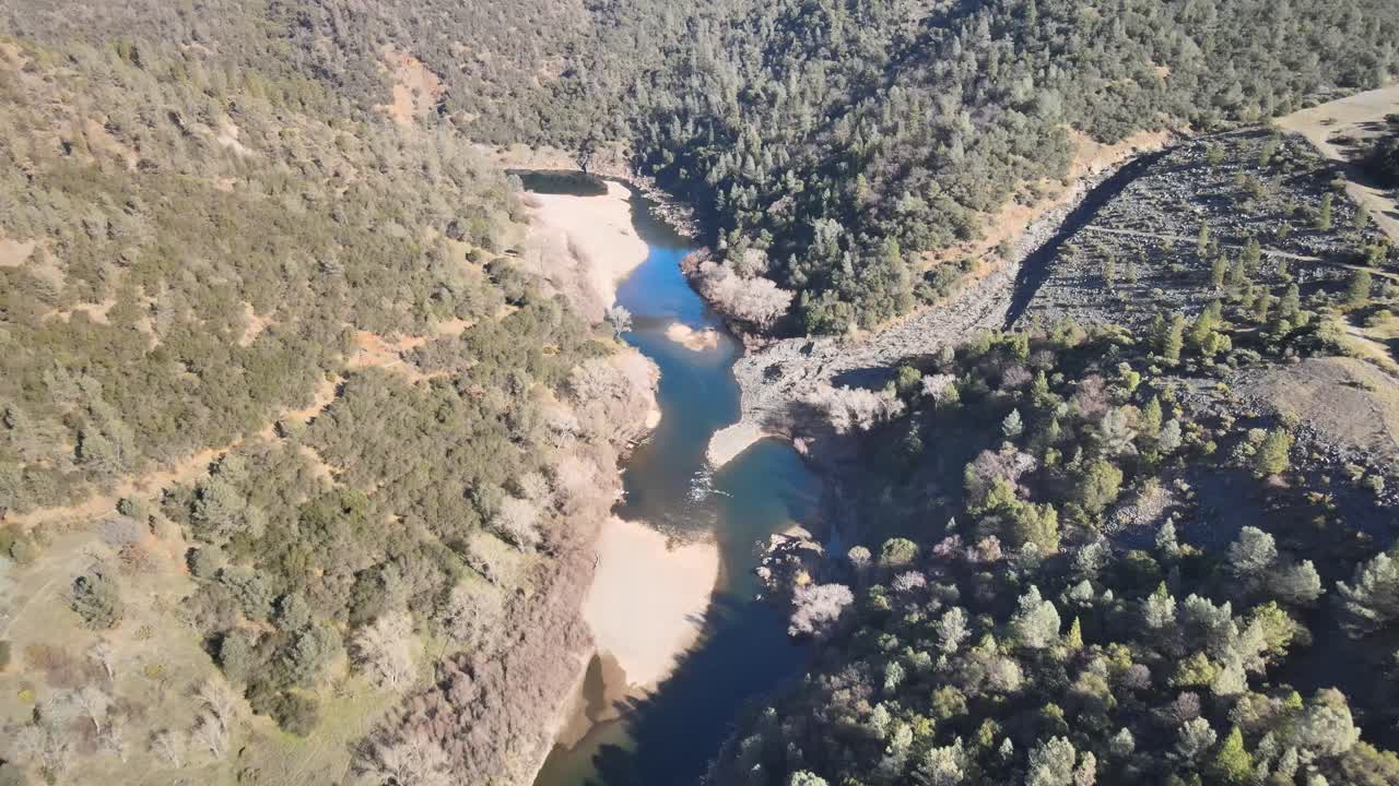 Slowly flying over the North Fork American river in the Sierra Nevada.