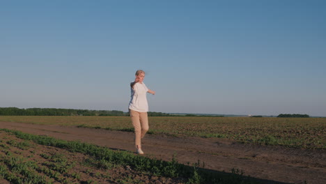 woman enjoying a walk in a country field