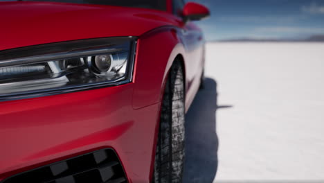 red audi a5 on a salt flat