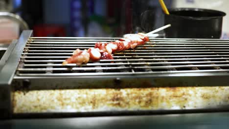 street food grilling in hong kong market