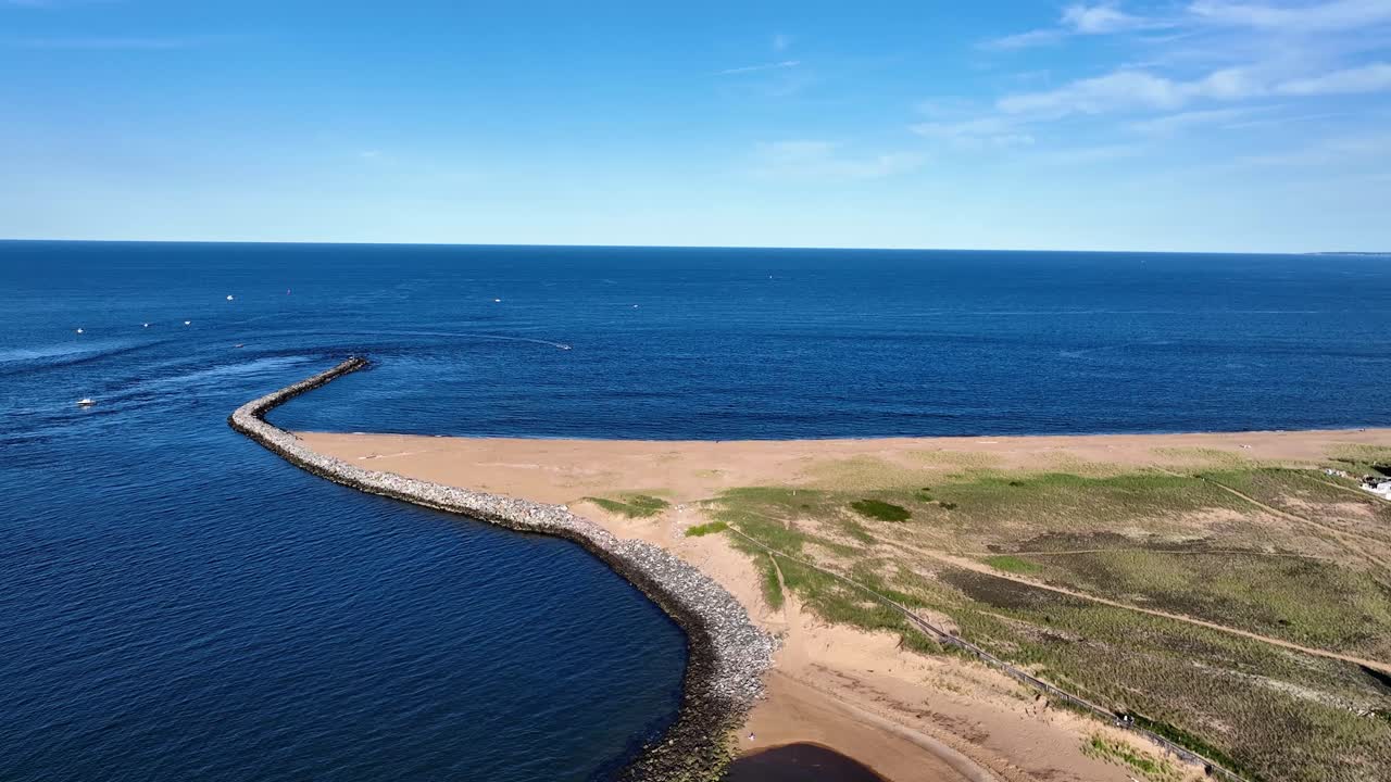 Drone view of New England beach and jetties in Massachusetts