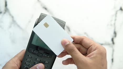 using a credit card at a point of sale terminal