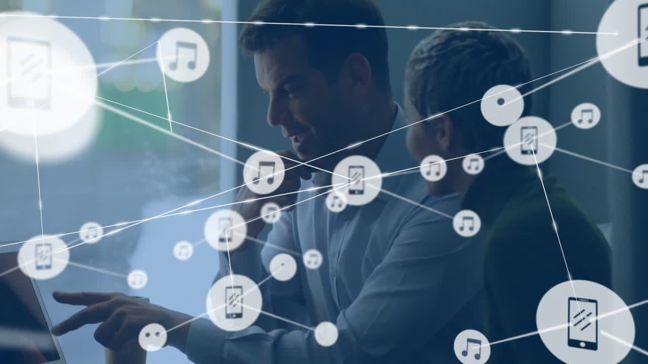 Animation of network of connections with devices icons over diverse business people in office
