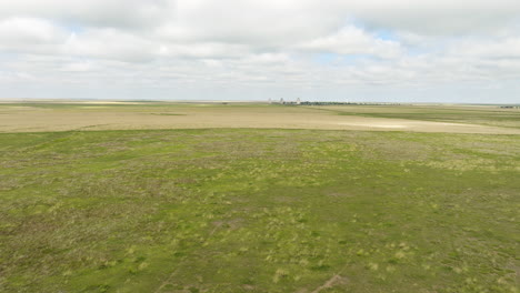 aerial view of farmland and windmill