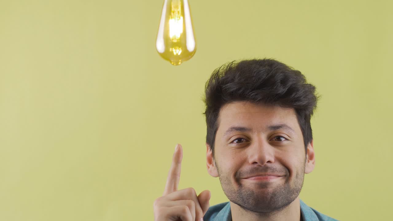 When an idea comes to mind, the light bulb goes on above the man's head. Idea and Thought.