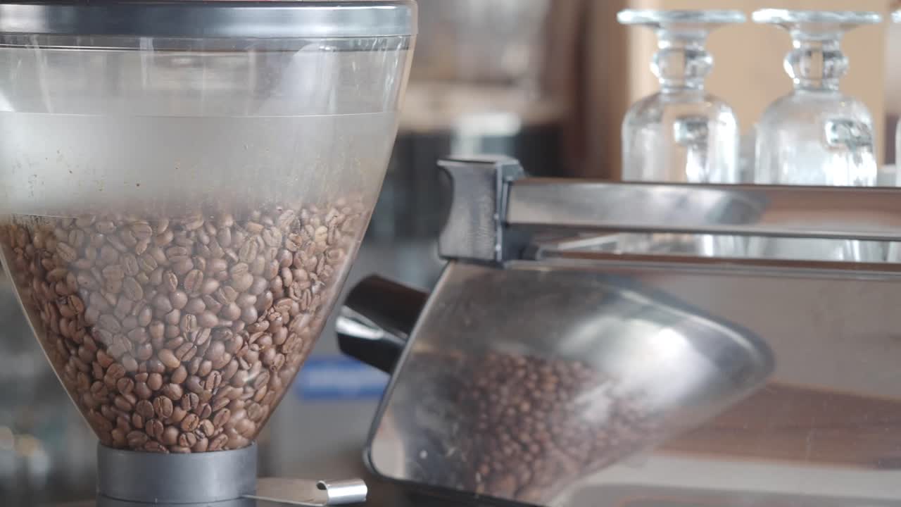 Coffee beans in a grinder