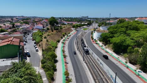 drone shot following a tram