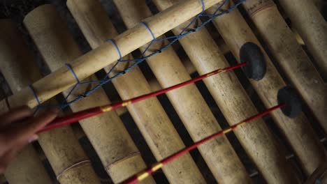 Slow-Motion-handheld-shot-of-someone-playing-an-Indonesian-Xylophone