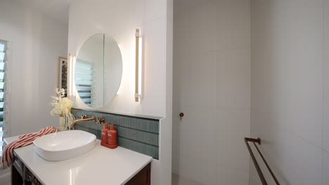 rustic barn style bedroom bathroom and sink with cozy ambiance and minimalist furnishings in open layout
