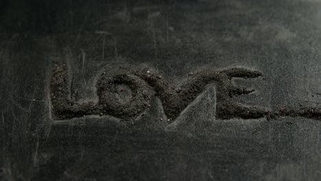 love word arranged on concrete background 4k