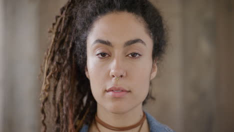 close-up-portrait-of-beautiful-young-mixed-race-woman-looking-calm-pensive-female-dreadlocks-hairstyle-real-people-series