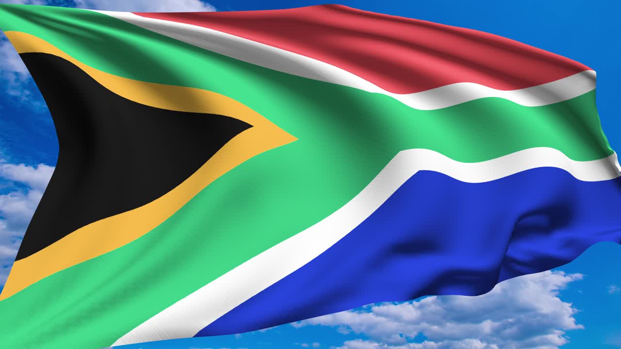 Flag of South Africa against a cloudy sky (alpha channel, loopable)
