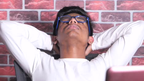 teenager relaxing in chair