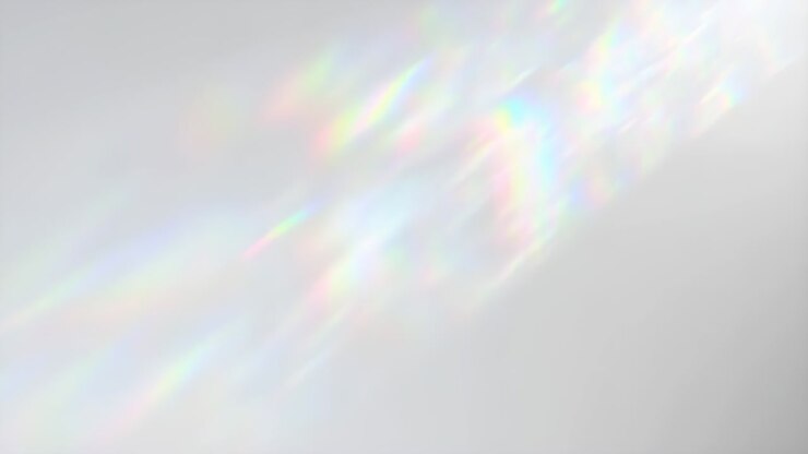 Riflessi di luce arcobaleno astratti su uno sfondo bianco