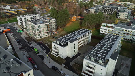 establishing shot of modern apartment buildings neighborhood with streets