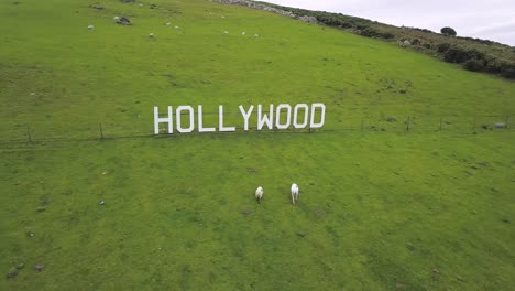 irish village hollywood sign point of view close up aerial shot