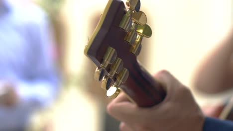 shot of guitar and tambourine player