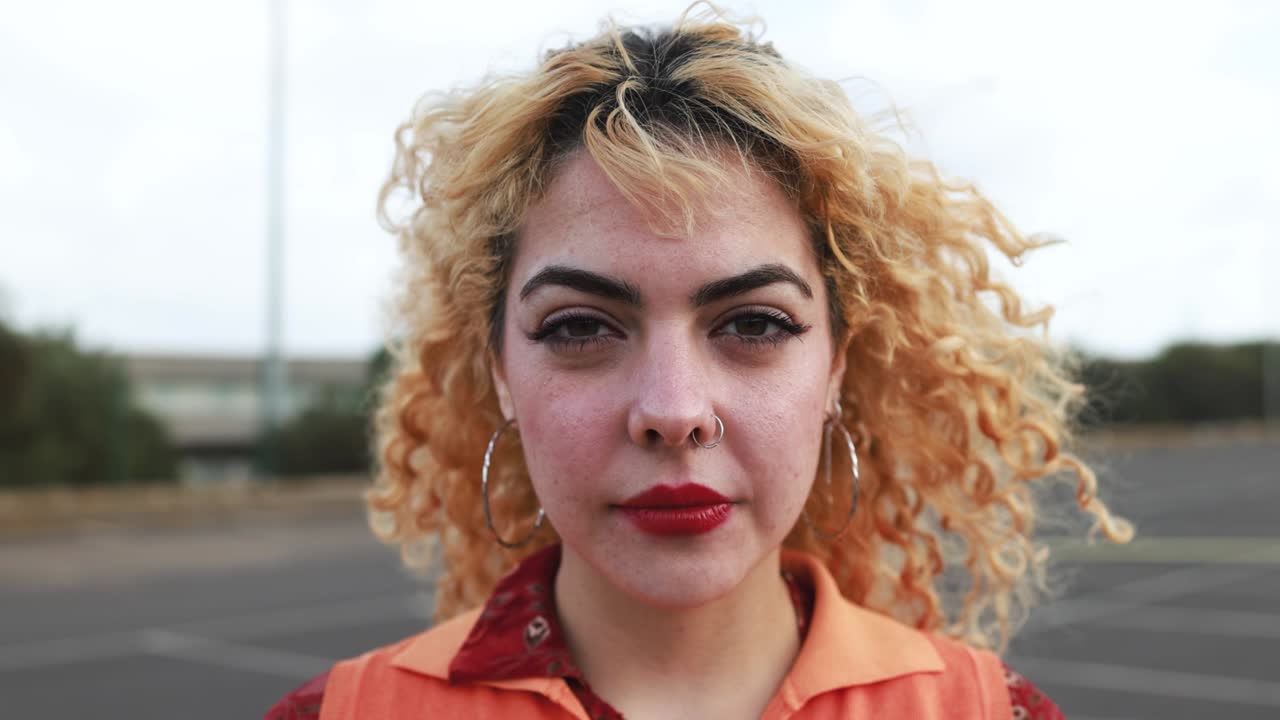 Young girl looking on camera outdoor
