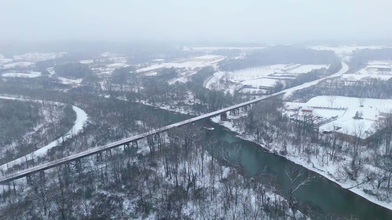 Static aerial shot of the snow covered Chattahoochee River and National Park in Atlanta, Georgia on January 10th 2025.