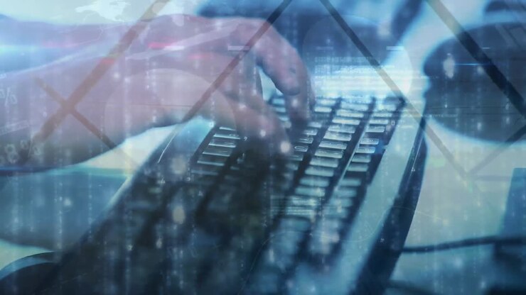 Animation of glowing light and person typing on computer keyboard