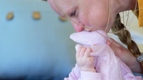mother playing with her baby boy 4k