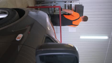 mechanic working in a car repair shop