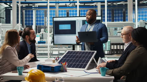 portrait of smiling photovoltaics factory researchers