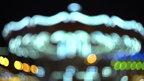 amusement park at night, the bright lights are lit ferris wheel. 4k video background