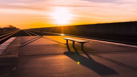 empty train platform at golden hour